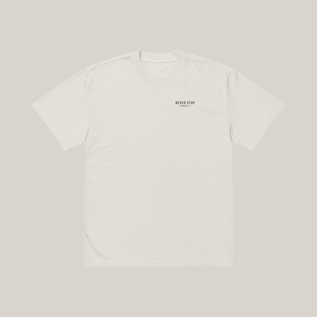 Run Department Casual Tee, front print in Charcoal on Faded Bone, alternate placement · grey